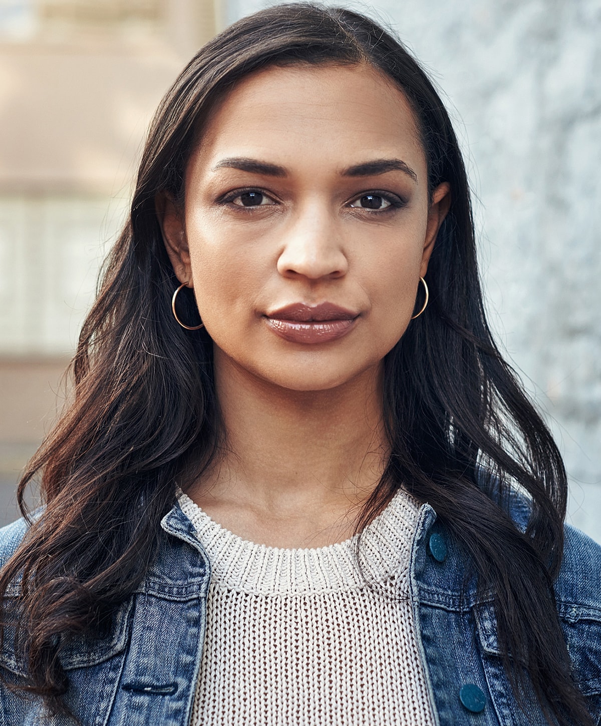 Close-up portrait of a woman with long hair.