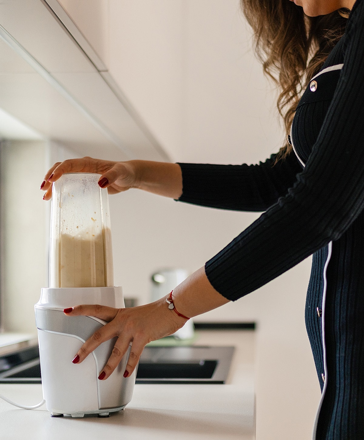 Making a smoothie in a kitchen blender.